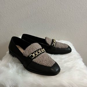 Vince Camuto Black leather loafers w/ a teddy bear fabric detail